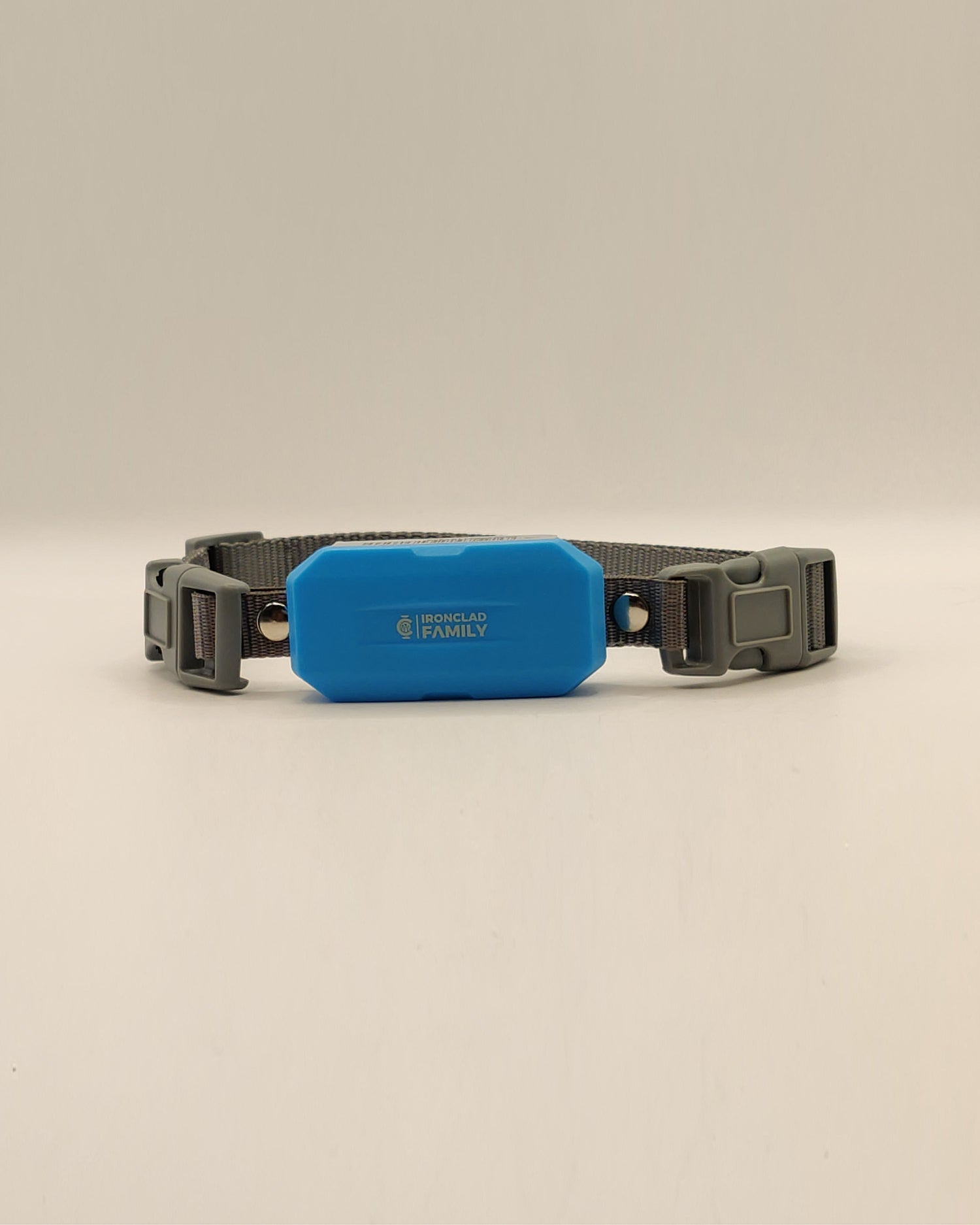 GPS tracker for pets, specifically designed for dogs, featuring an app and sim card, displayed on a blue and gray collar with a small button