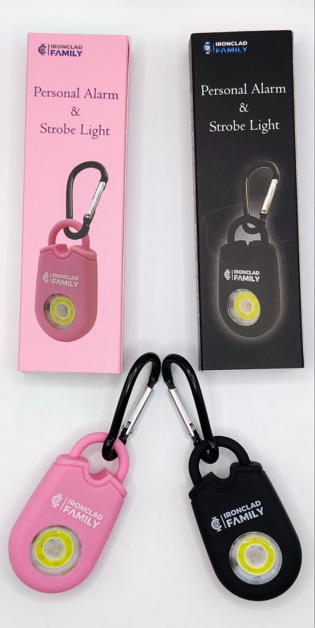 Pink personal alarm keychain with strobe light feature