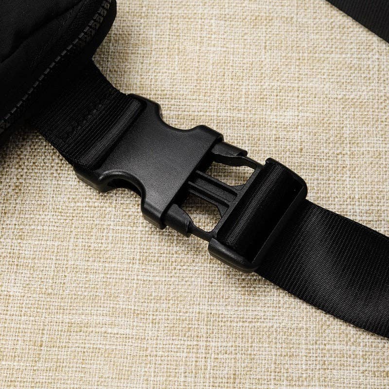 Black belt of the Fanny Pack Crossbody Belt Bag with a buckle