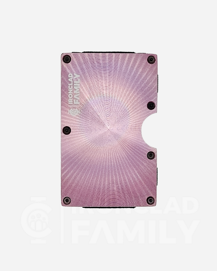 Pink version of textured metal RFID blocking wallet against black background