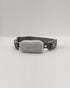 Grey dog collar featuring a compact tracking device