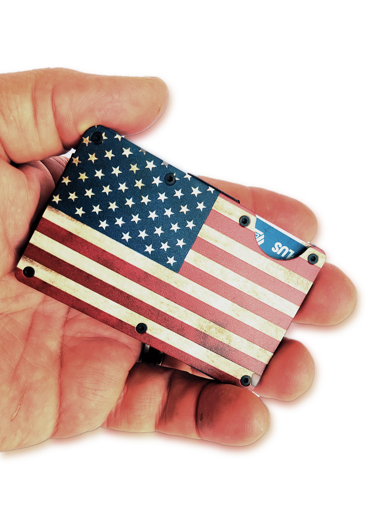 Hand holding the compact Old Glory metal RFID blocking wallet