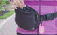 Woman wearing a pink top and the Personal Alarm with Fanny Pack Crossbody Belt Bag