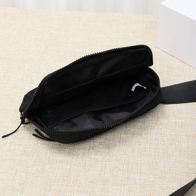 Black Crossbody Belt Bag with a zippered compartment