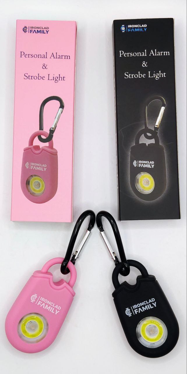 Pink personal alarm keychain with strobe light feature