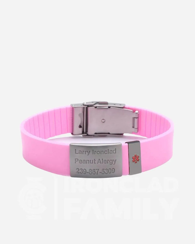 Pink silicone medical alert bracelet with a silver identification tag