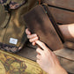 A person holding a high-quality RFID blocking cowhide leather multi-passport holder