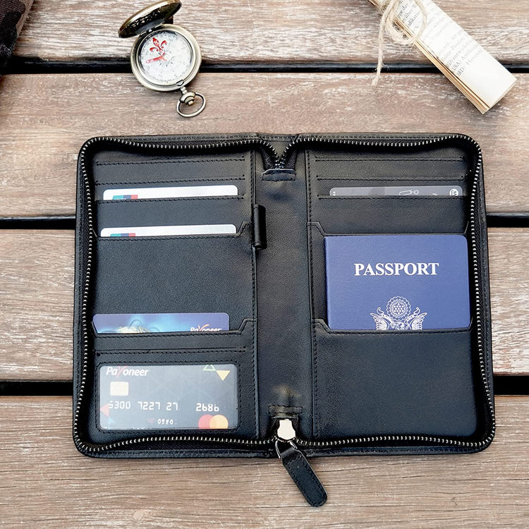 Passport, wallet, and other essentials in a cowhide leather passport holder