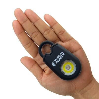 Hand holding the compact Personal Alarm Sound Pendant Keychain
