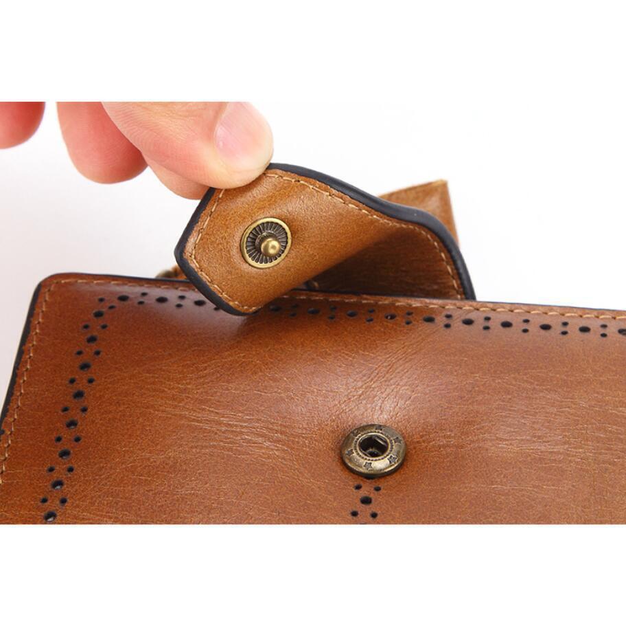 Person showcasing a buttoned brown leather wallet with RFID blocking technology